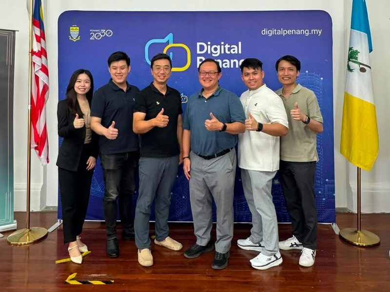 NixFrontier team with Digital Penang in front of the Digital Penang backdrop